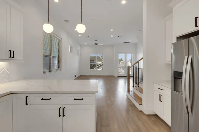a kitchen with a stove and a microwave