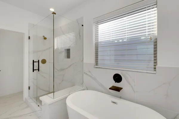 a bathroom with a double vanity sink