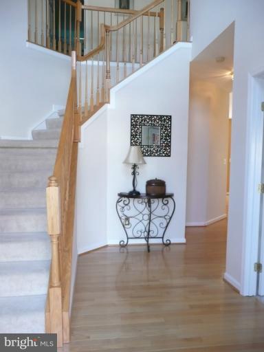 42739 Middle Ridge Place Broadlands, VA 20148 - Photo 17 of 30 a view of a bench in entryway