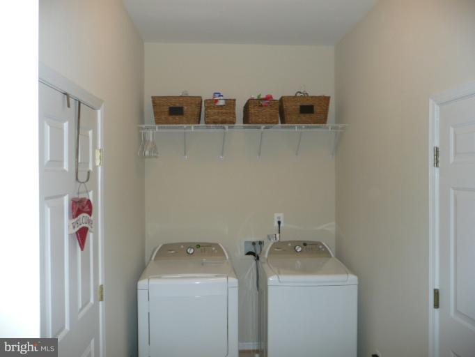 42739 Middle Ridge Place Broadlands, VA 20148 - Photo 19 of 30 a utility room with dryer and washer