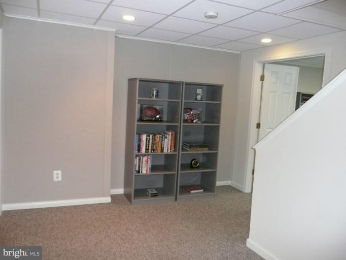42739 Middle Ridge Place Broadlands, VA 20148 - Photo 26 of 30 a view of room with furniture and closet