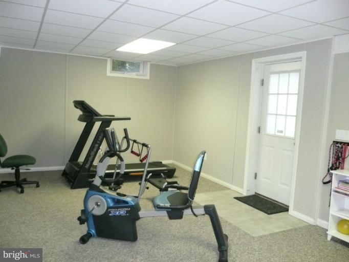 42739 Middle Ridge Place Broadlands, VA 20148 - Photo 27 of 30 a view of a room with gym equipment