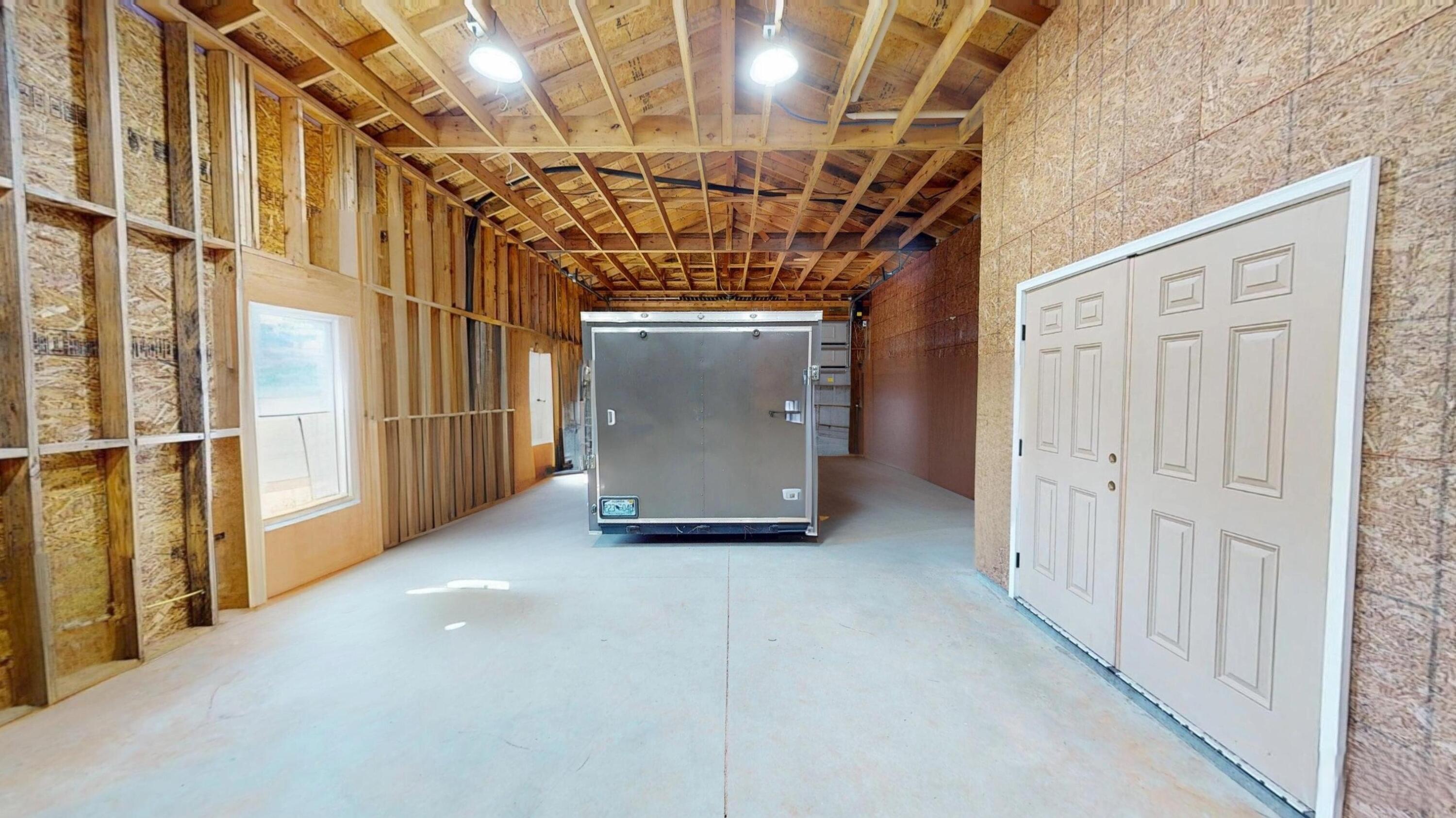 37837 Straughn School Road Out Of State, OUT OF STATE 00000 - Photo 39 of 59 a view of a hallway with wooden walls
