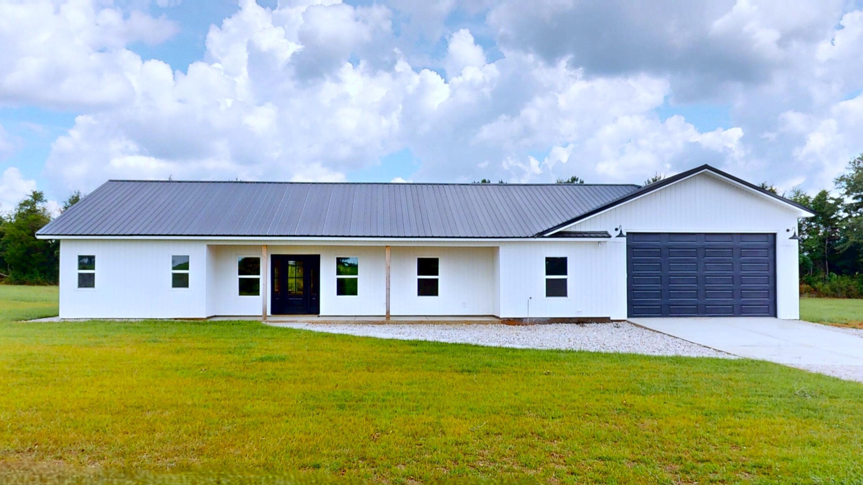37837 Straughn School Road Out Of State, OUT OF STATE 00000 - Photo 4 of 59 a house view with a garden space