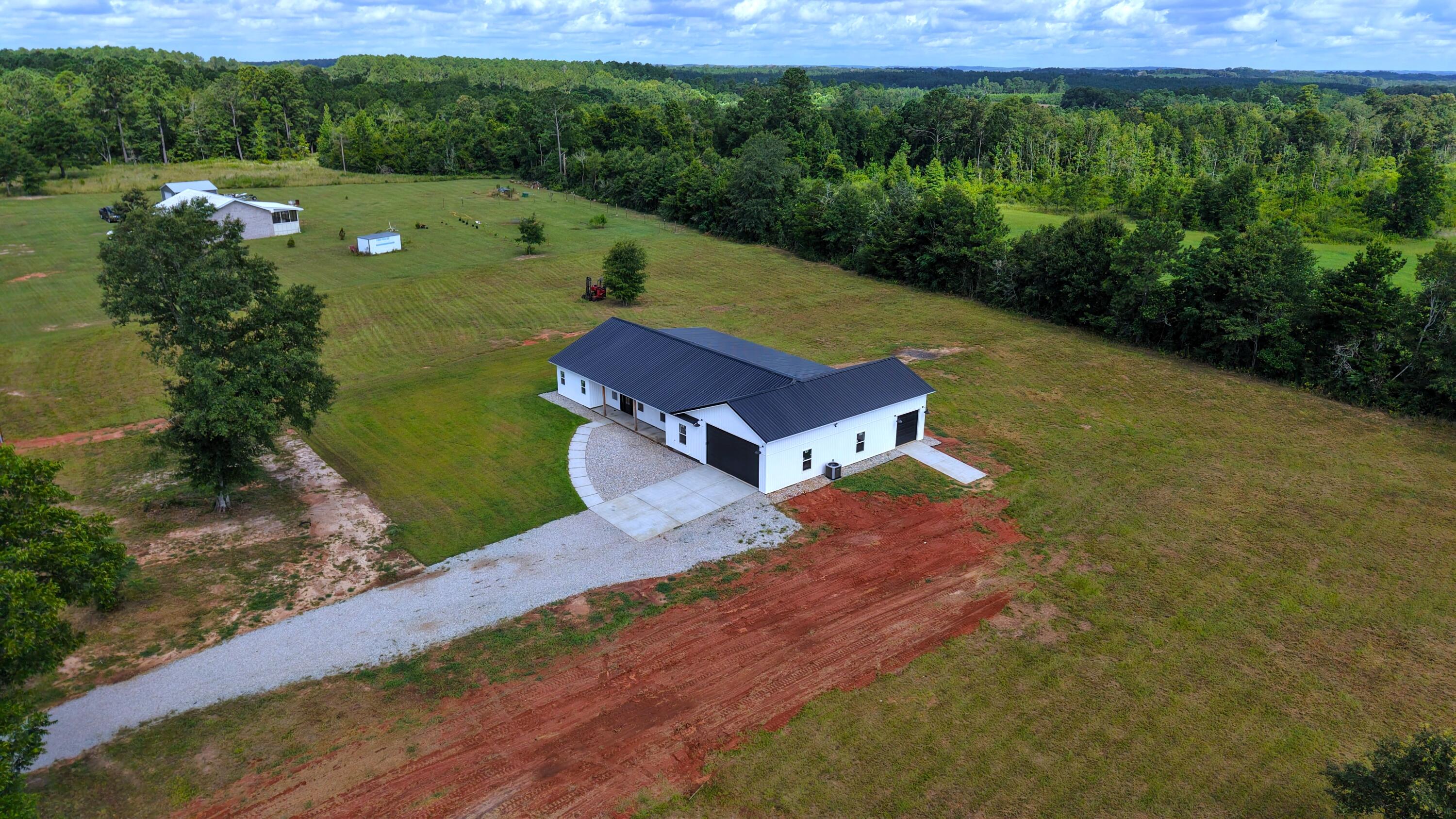 37837 Straughn School Road Out Of State, OUT OF STATE 00000 - Photo 54 of 59 a view of a yard with front of house