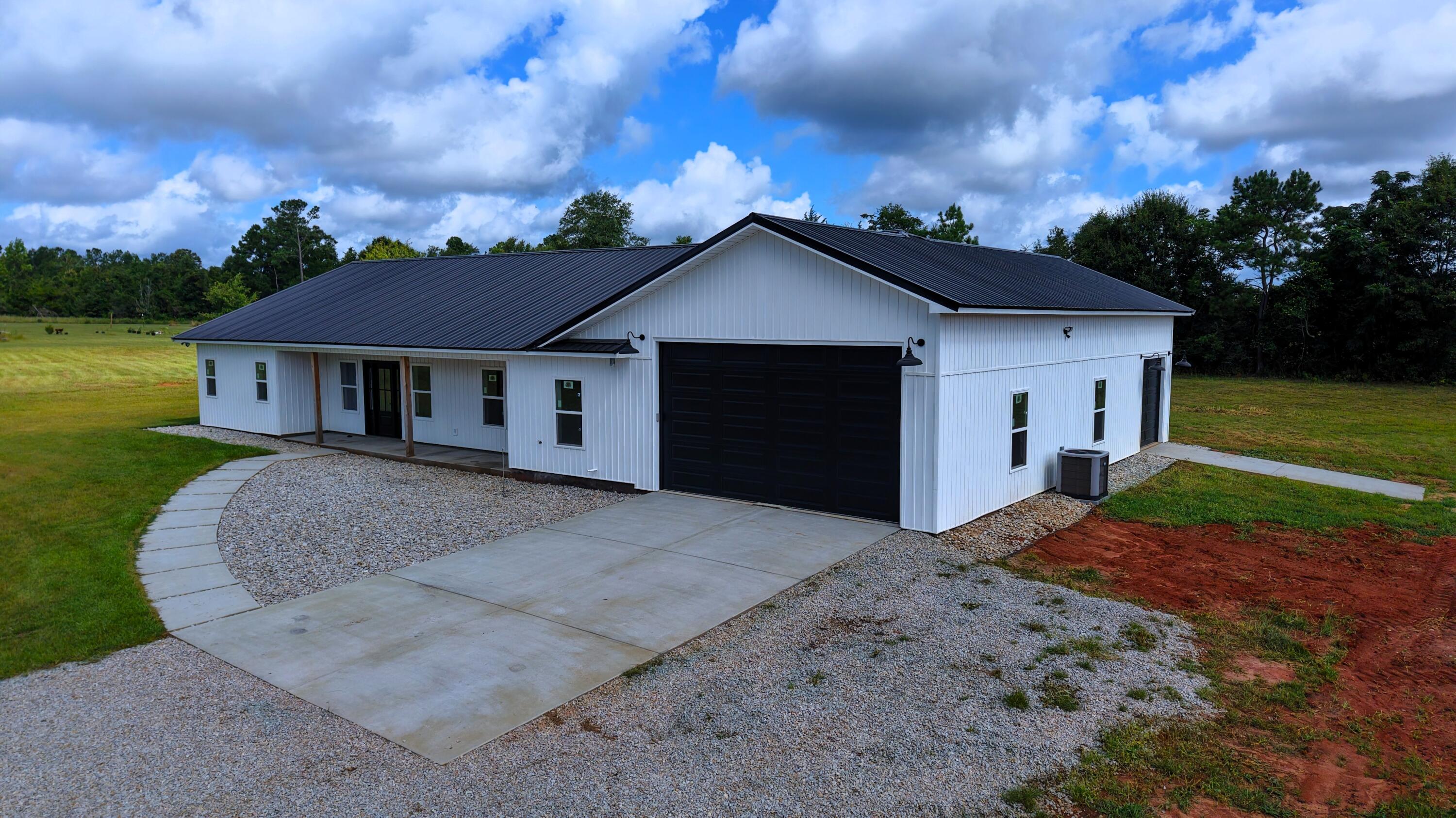 37837 Straughn School Road Out Of State, OUT OF STATE 00000 - Photo 6 of 59 a view of a house with a yard