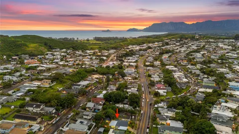 a view of a city with mountains in the background
