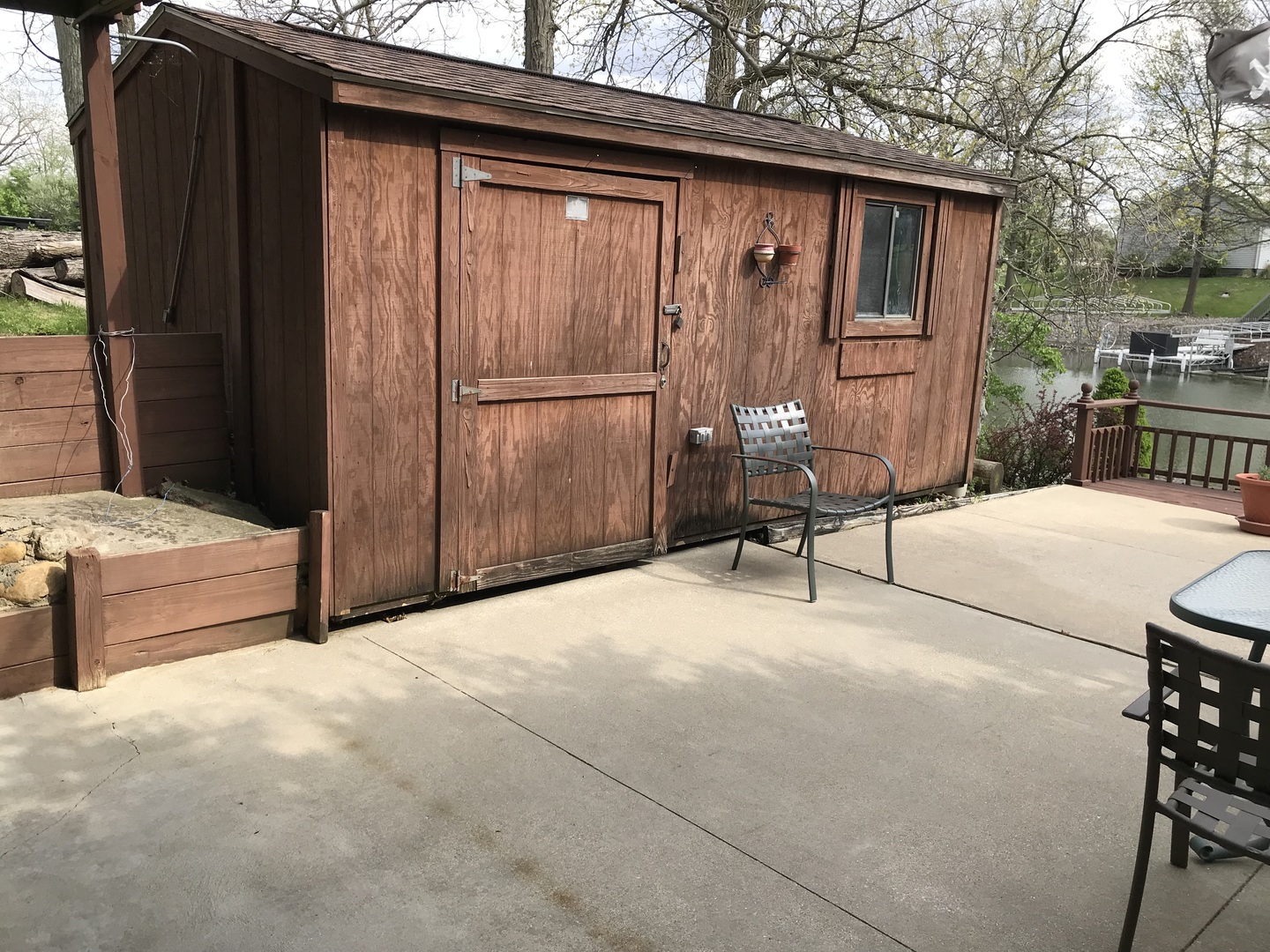 117 County Road 320 North Loda, IL 60948 - Photo 22 of 27 a view of a chairs and bench in the backyard
