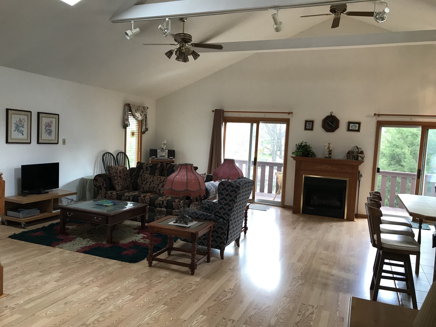 117 County Road 320 North Loda, IL 60948 - Photo 3 of 27 a living room with furniture a fireplace and a flat screen tv