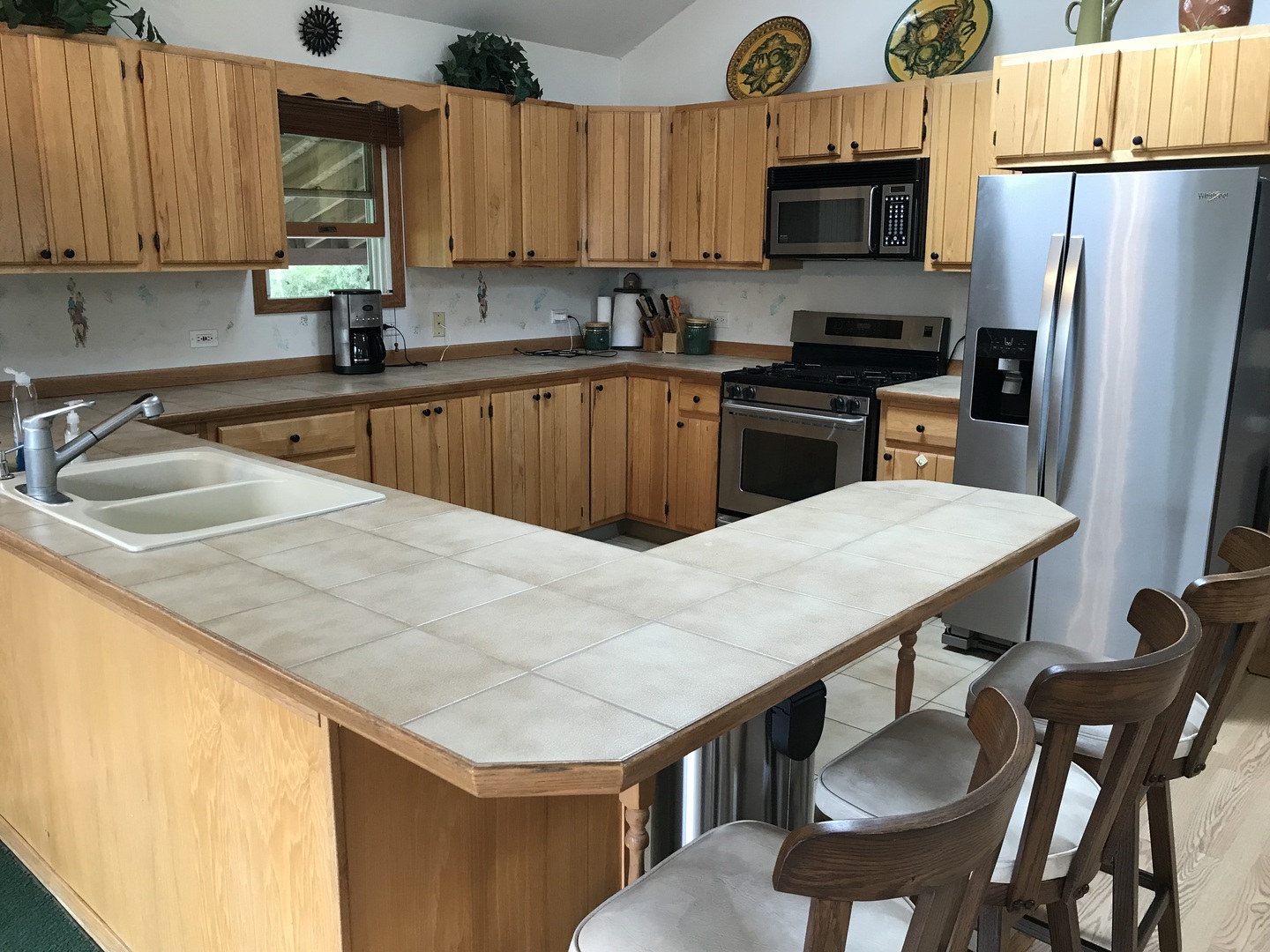 117 County Road 320 North Loda, IL 60948 - Photo 5 of 27 a kitchen with a table chairs sink and cabinets