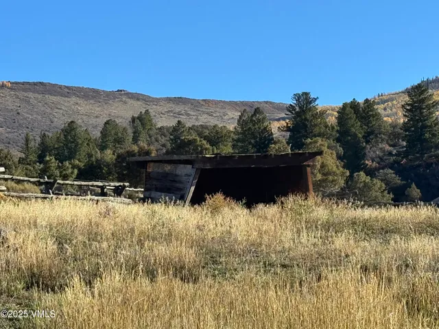 a view of a lake with a mountain in the background
