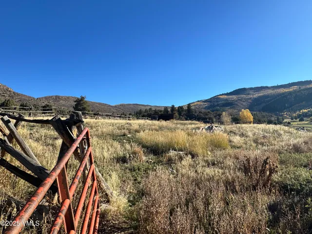 a view of a lake with mountains in the background