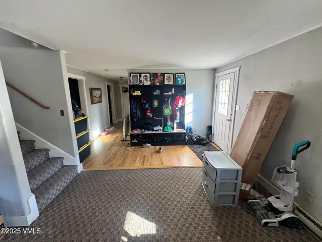 a room with furniture and a flat screen tv