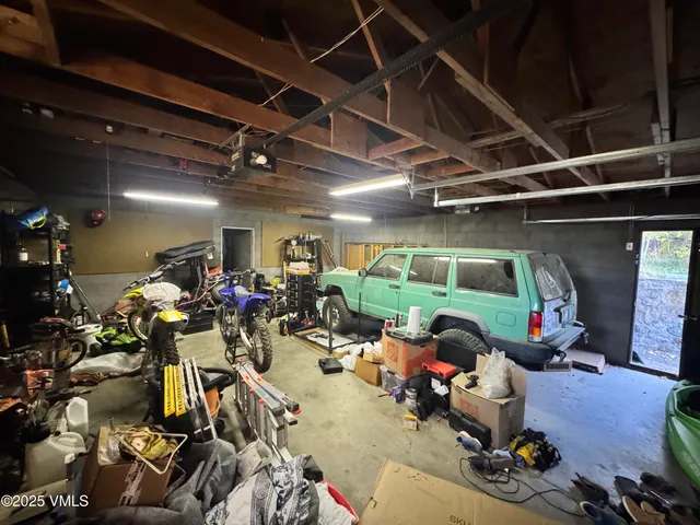 a room with lots of flower plants