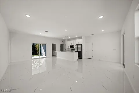 a view of a kitchen with a sink