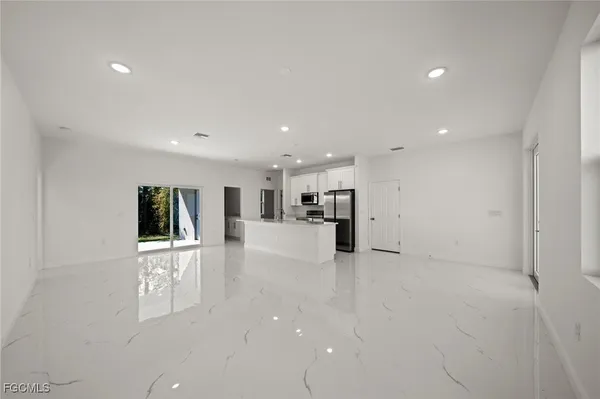 a view of a kitchen with a sink