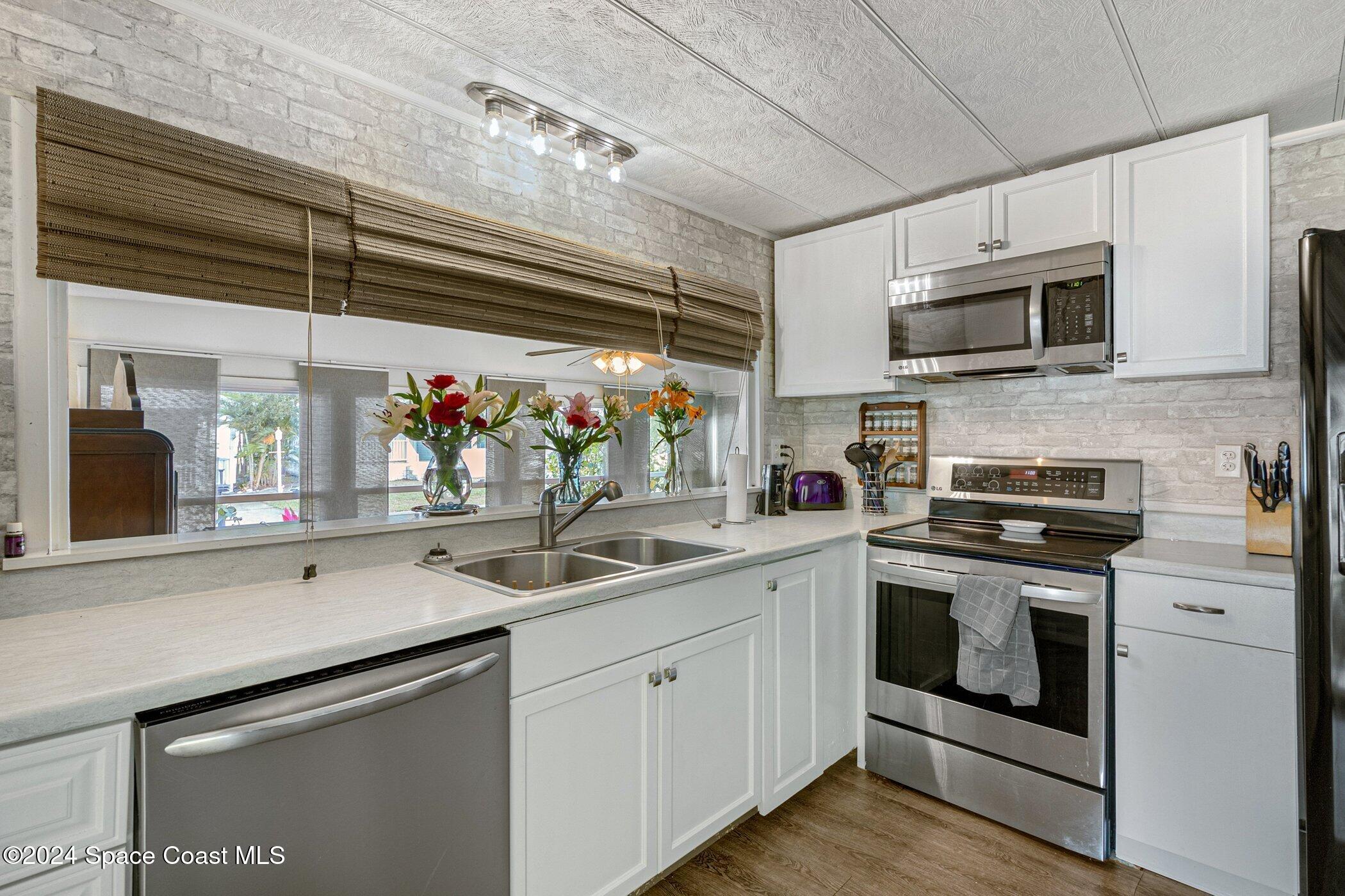 921 Laurel Circle Barefoot Bay, FL 32976 - Photo 1 of 56 921-Laurel-206.jpg-SMALL