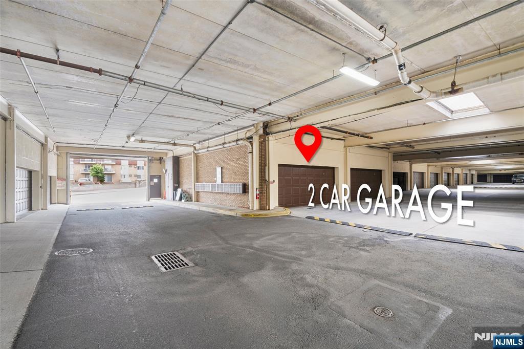 300 Gorge Road, Unit 57 Cliffside Park, NJ 07010 - Photo 23 of 30 a view of a garage with furniture