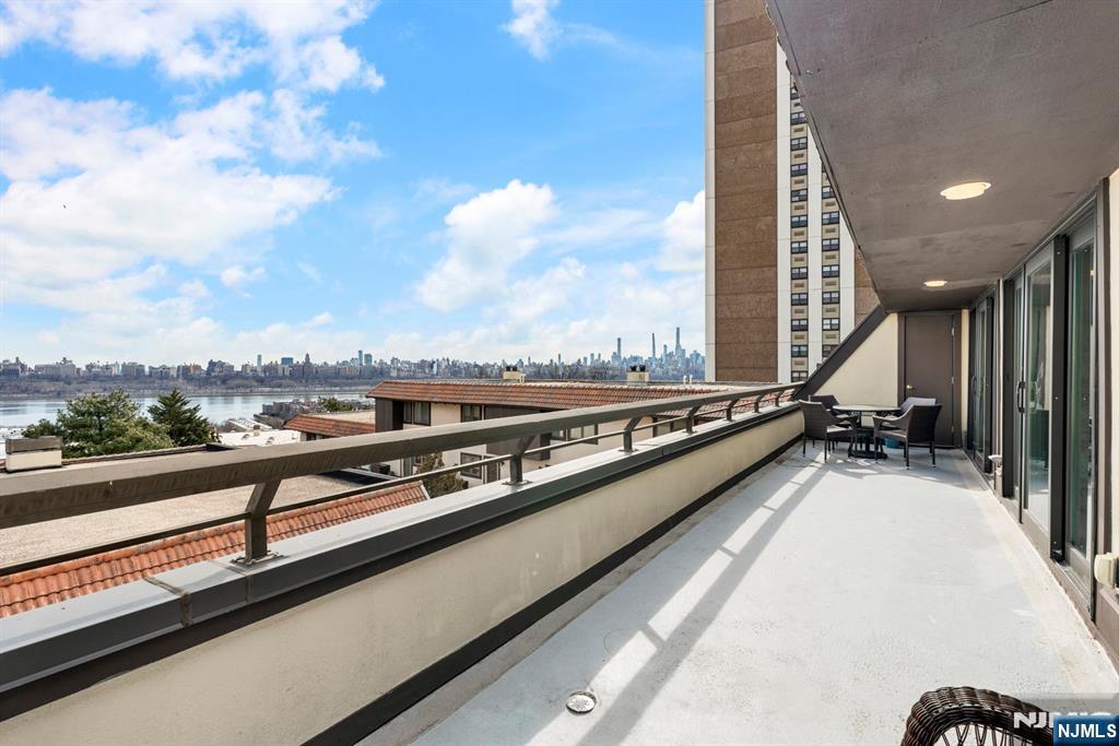 300 Gorge Road, Unit 57 Cliffside Park, NJ 07010 - Photo 7 of 30 a view of balcony and furniture