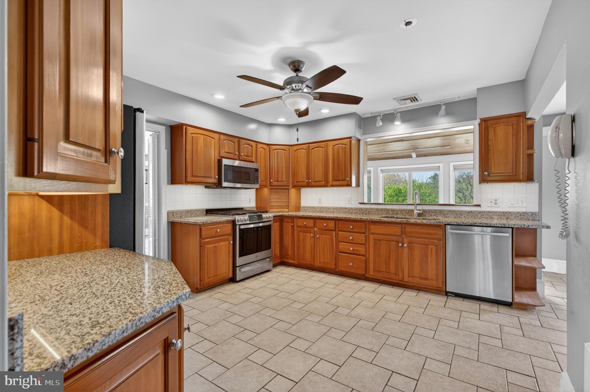 300 Sanatoga Road Pottstown, PA 19465 - Photo 27 of 79 Modern kitchen with warm wood tones.