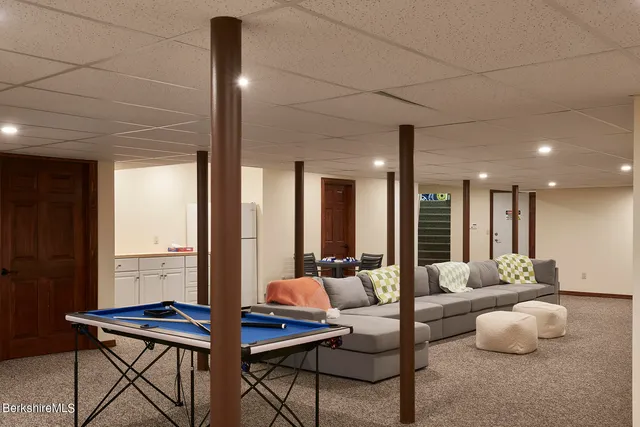 a bathroom with a sink and mirror
