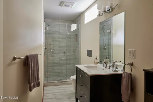 a view of yard with patio