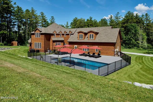 a view of a park with large trees