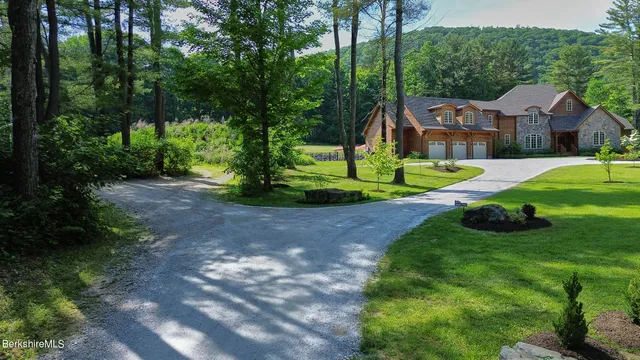 a view of a park with large trees