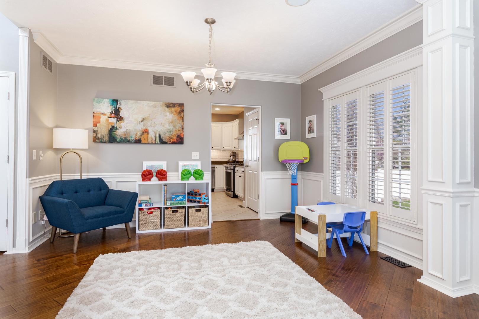 1223 Joy Walk Way Normal, IL 61761 - Photo 15 of 48 a living room with furniture and a chandelier