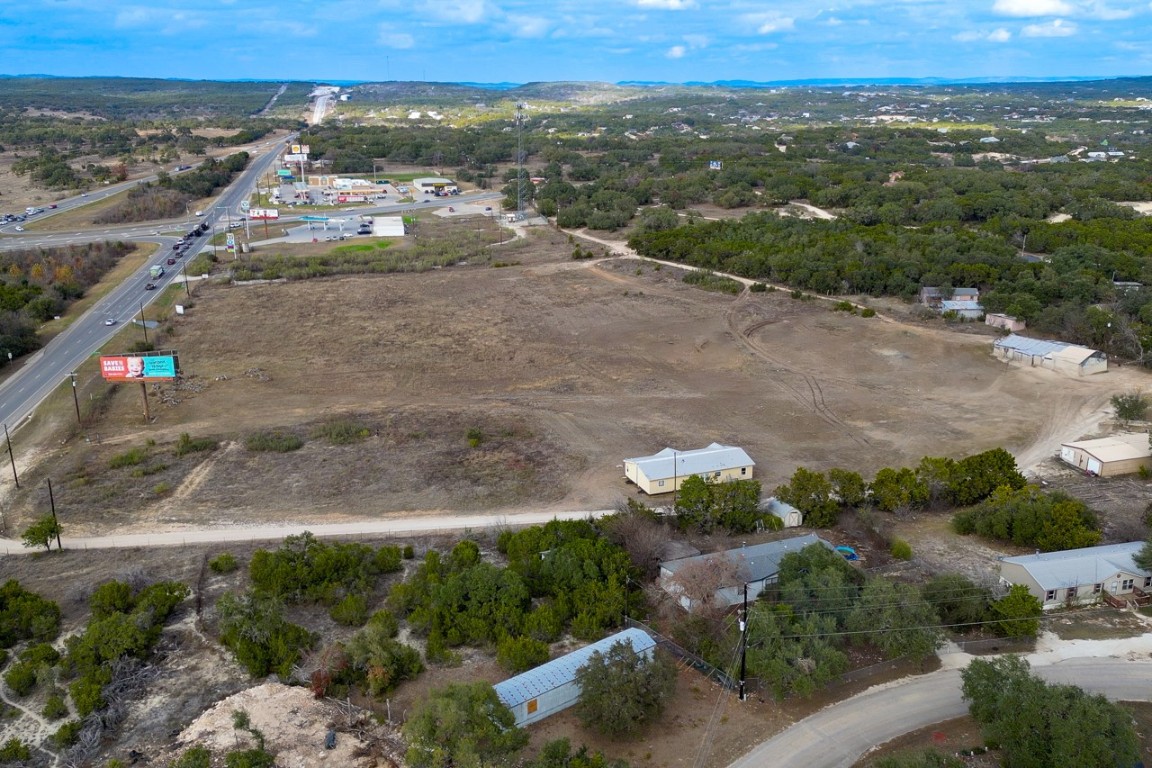13970 Highway 281 North Spring Branch, TX 78070 - Photo 10 of 12 an aerial view of residential houses with outdoor space