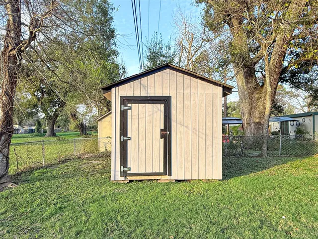 a view of backyard with green space