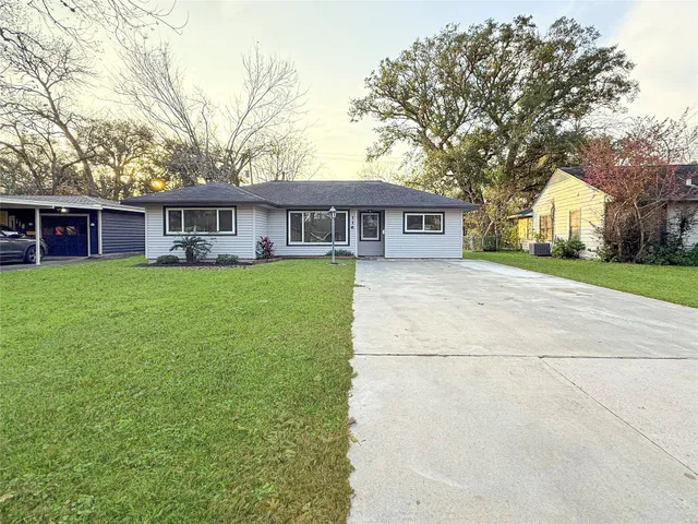 front view of a house with a yard