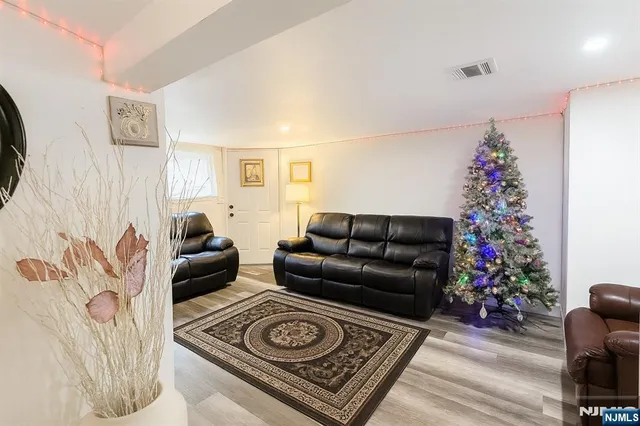 a living room with furniture and a couch