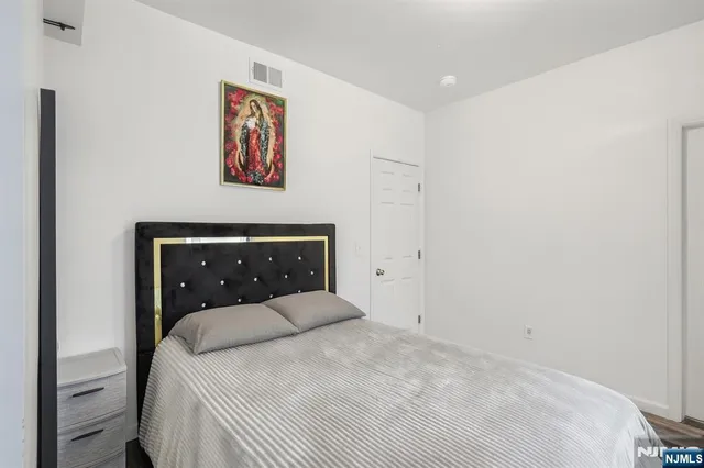 a bathroom with a shower toilet and a sink