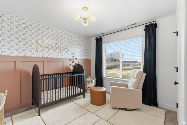 596 South Meade Street Mapleton, UT 84664 - Photo 13 of 38 Bedroom with, a decorative wall, a crib, and a wainscoted wall