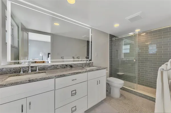 a view of a hallway with washer and dryer