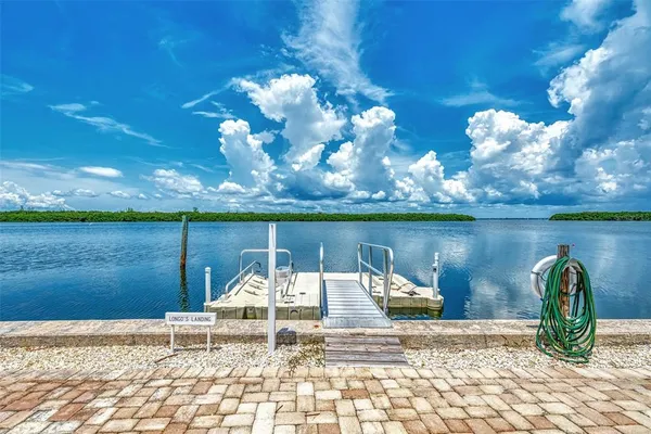 a view of a lake with a building in the background