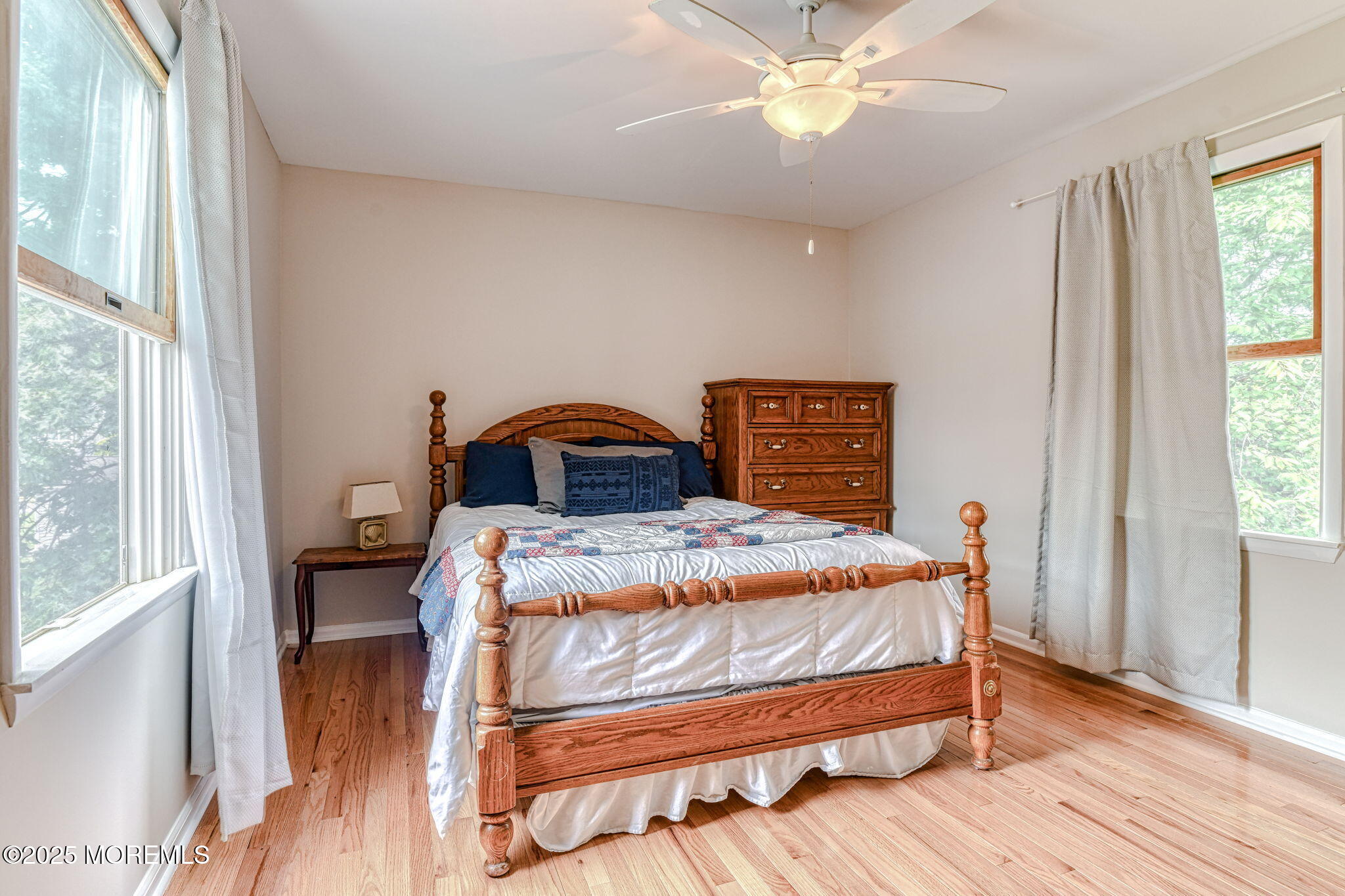 24 Peach Tree Road Oakhurst, NJ 07755 - Photo 11 of 34 a bedroom with a bed and a window