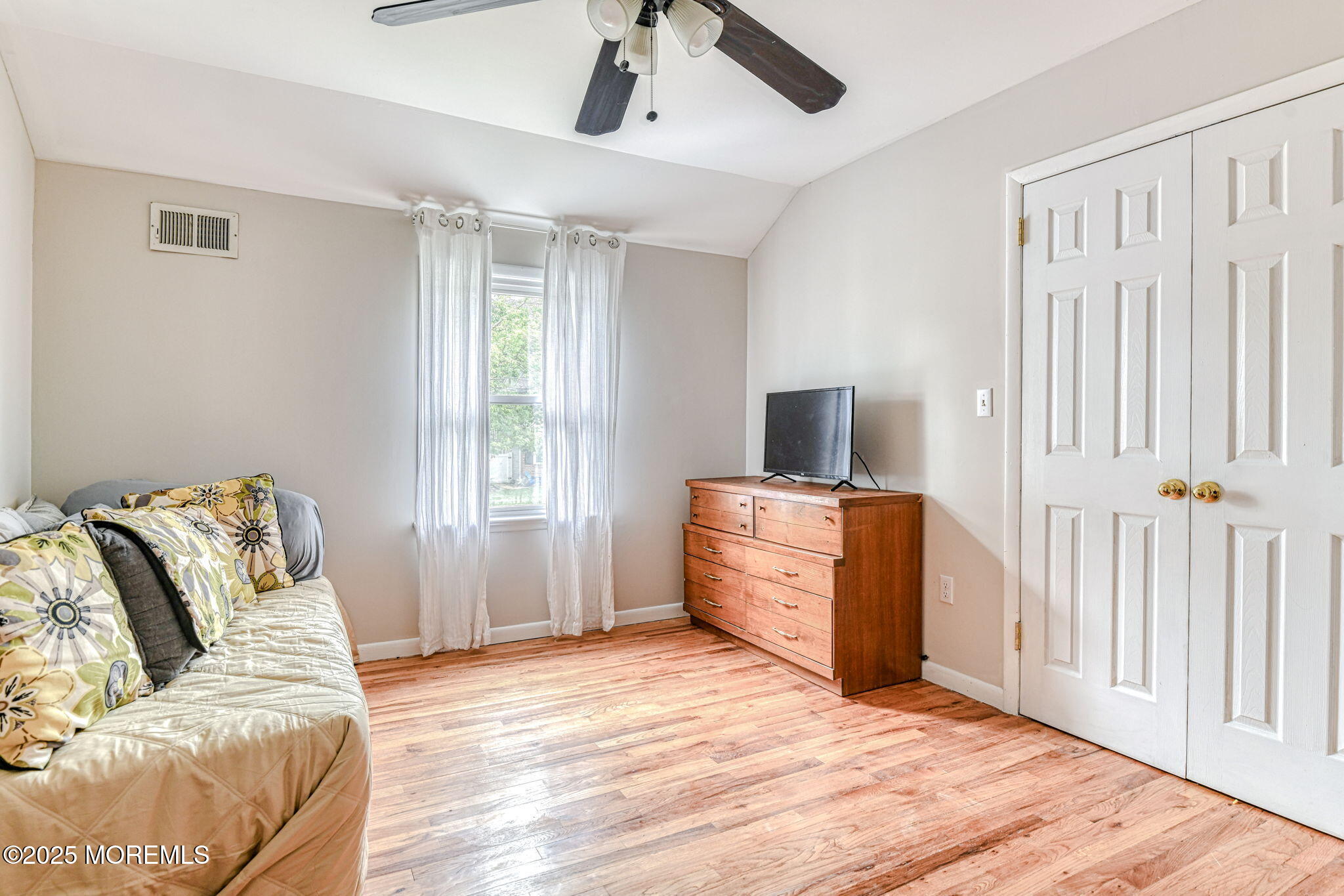 24 Peach Tree Road Oakhurst, NJ 07755 - Photo 15 of 34 a bedroom with furniture and a window