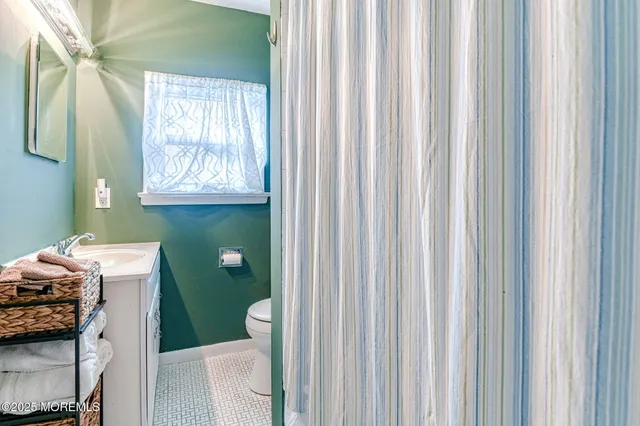 a bathroom with a sink and a toilet