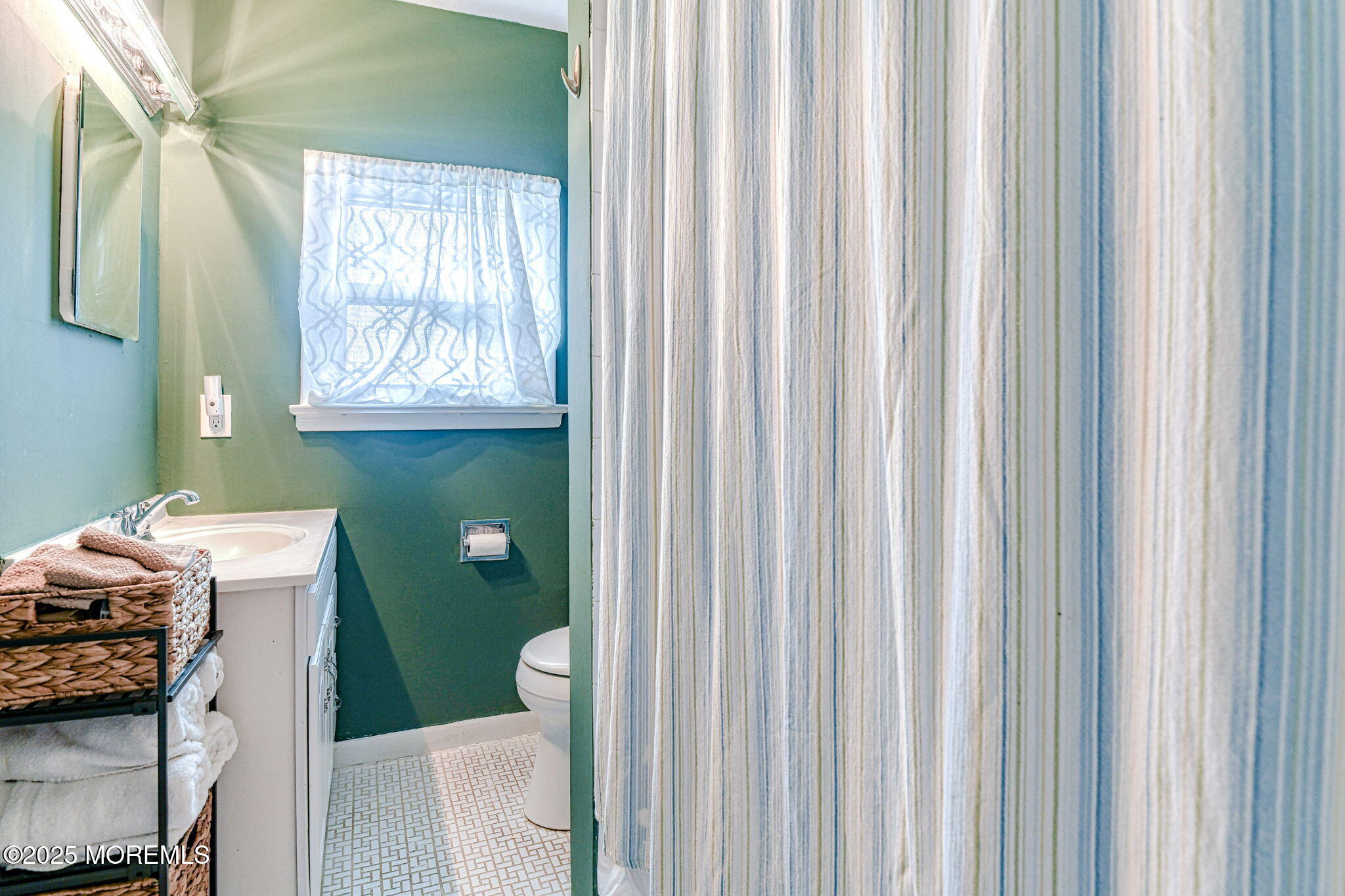 24 Peach Tree Road Oakhurst, NJ 07755 - Photo 17 of 34 a bathroom with a sink and a toilet