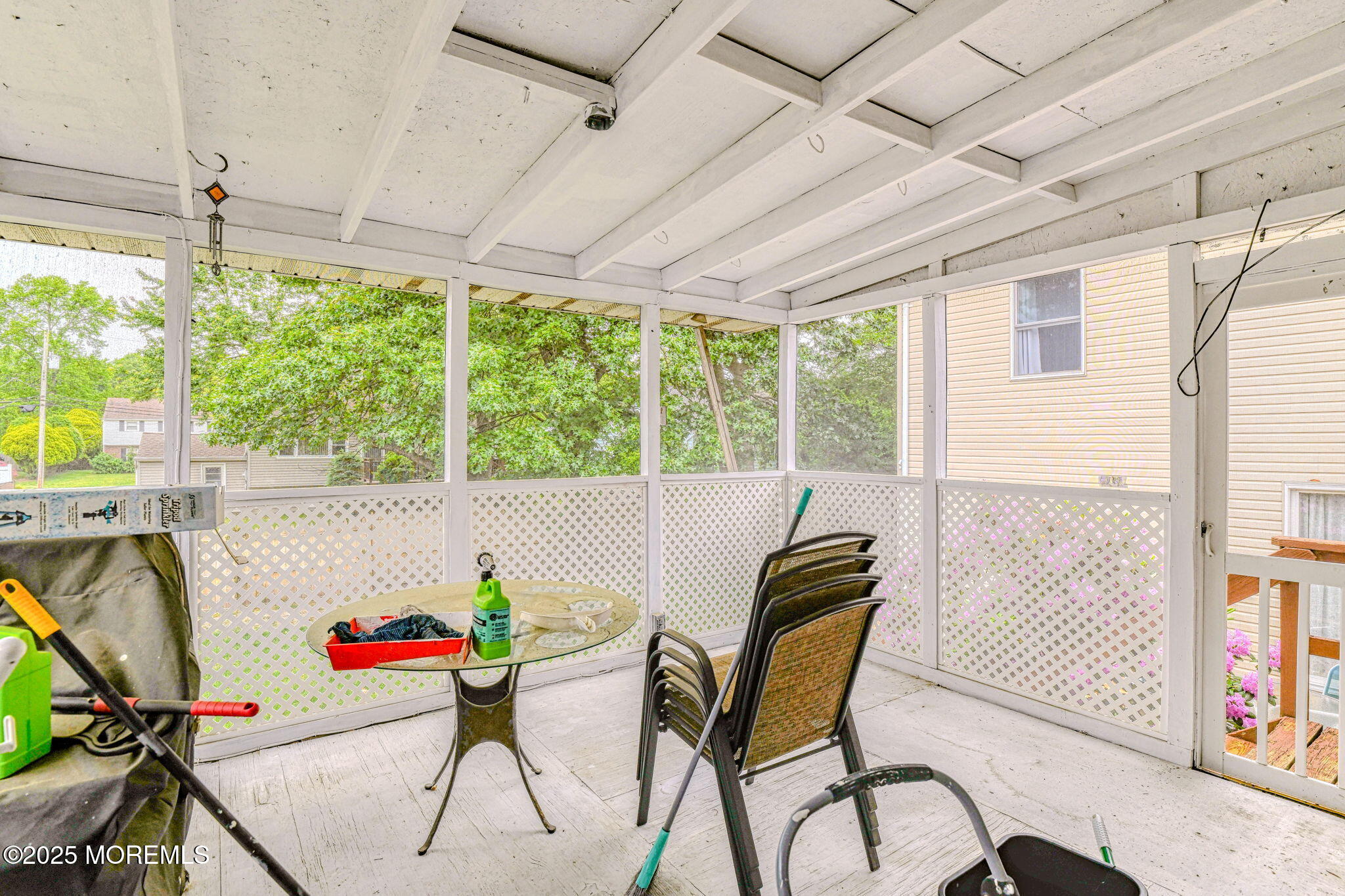 24 Peach Tree Road Oakhurst, NJ 07755 - Photo 29 of 34 a view of a dining room with furniture window and outside view