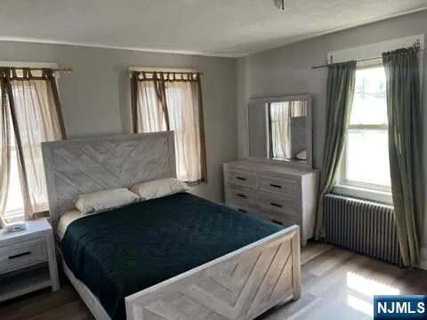 a living room with a couch and a fireplace