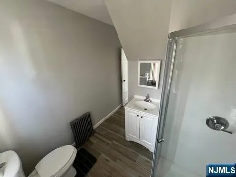 a bathroom with a toilet and a sink
