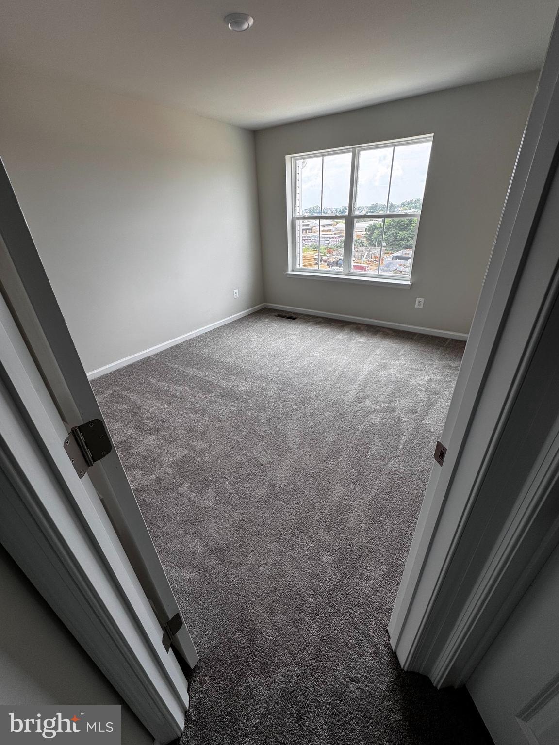 1258 Red Clover Lane Ranson, WV 25438 - Photo 11 of 25 an empty room with windows
