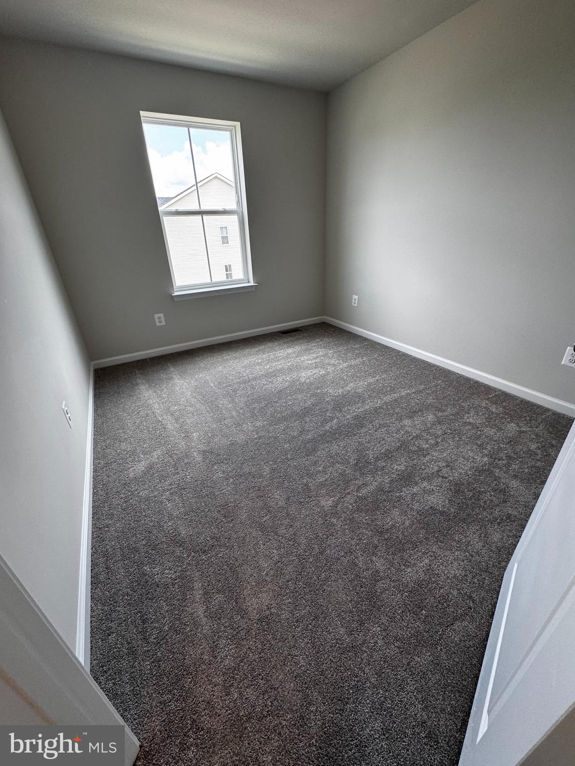 1258 Red Clover Lane Ranson, WV 25438 - Photo 20 of 25 an empty room with windows
