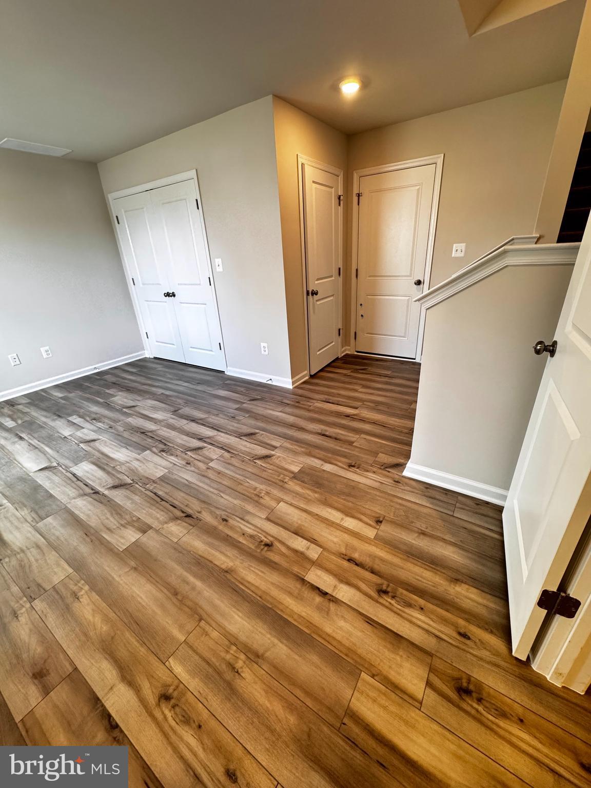 1258 Red Clover Lane Ranson, WV 25438 - Photo 5 of 25 a view of empty room with wooden floor