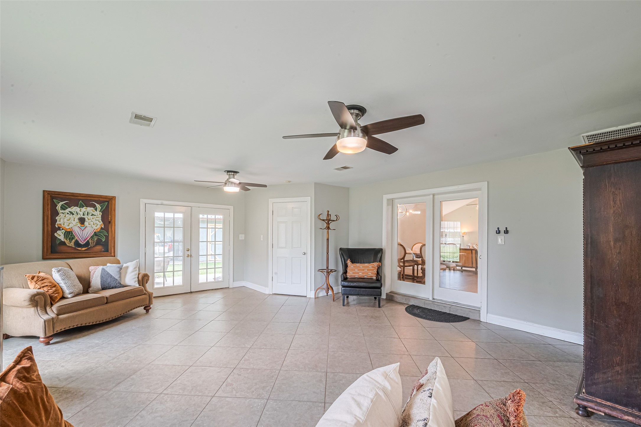 24314 Anderson Street Huffman, TX 77336 - Photo 28 of 48 a living room with furniture and a large window