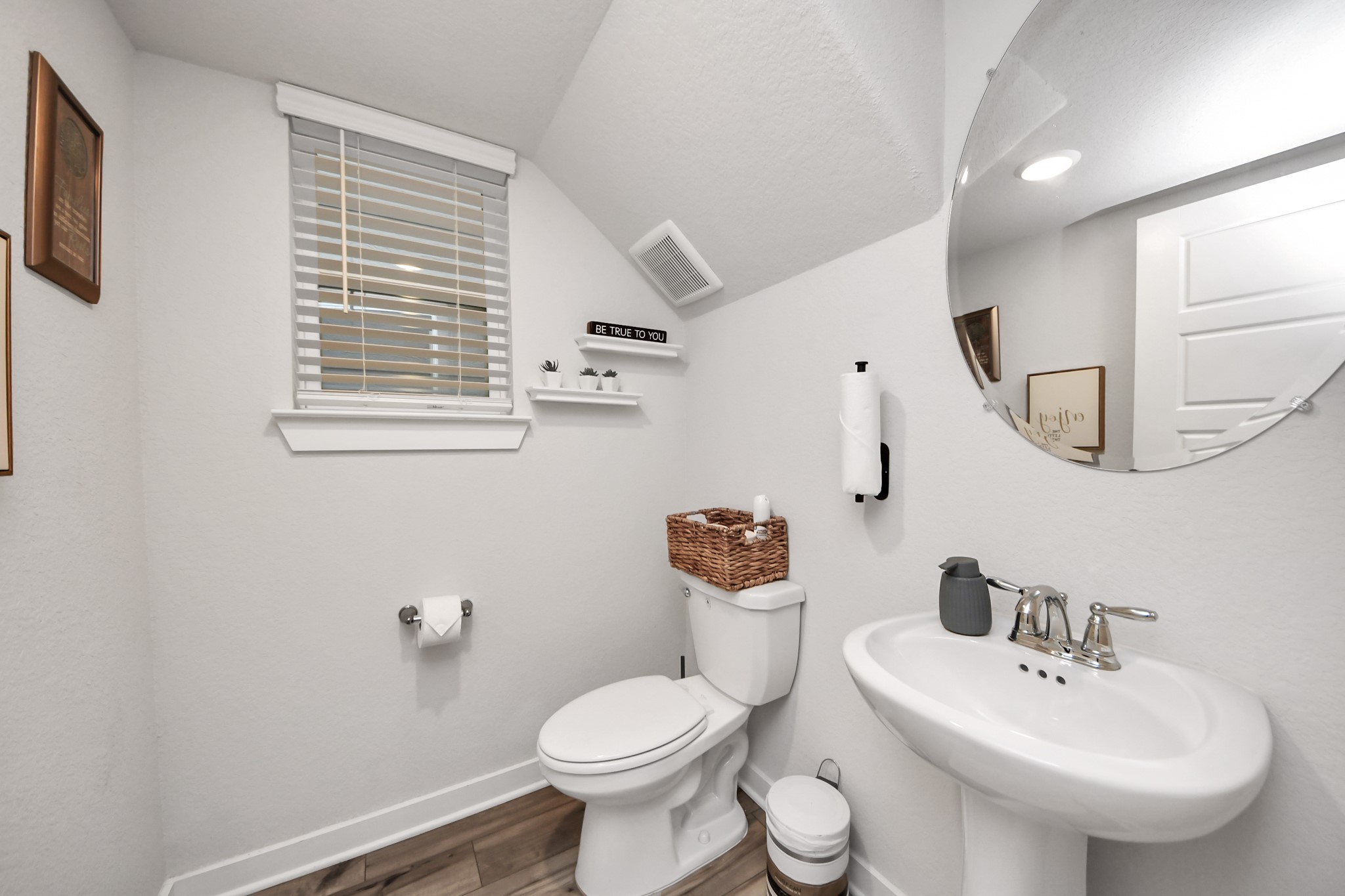 8207 Rising Stream Drive Houston, TX 77063 - Photo 24 of 50 a bathroom with a toilet sink and mirror