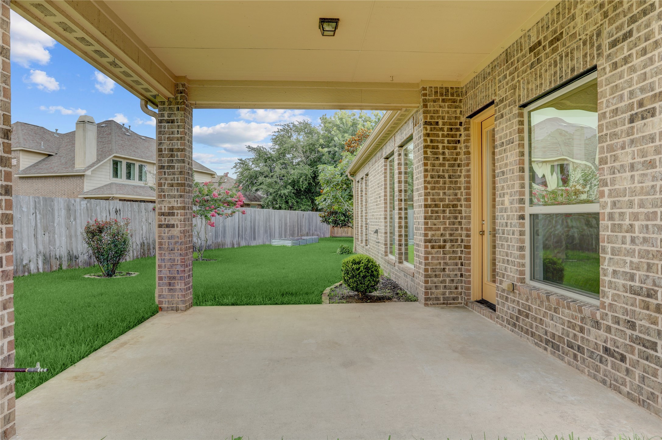 3002 Currant Drive Manvel, TX 77578 - Photo 38 of 43 a view of a house with a garden